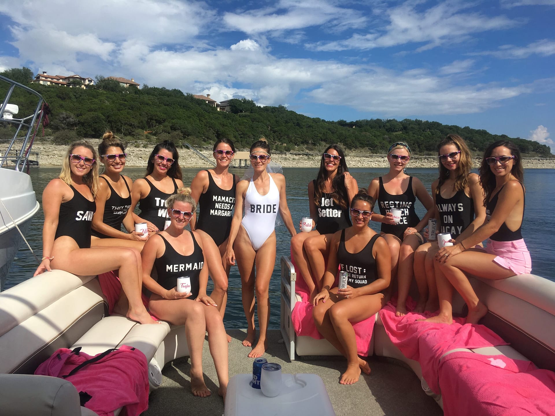 Group of girls celebrating bachelorette party on lake travis on a party boat